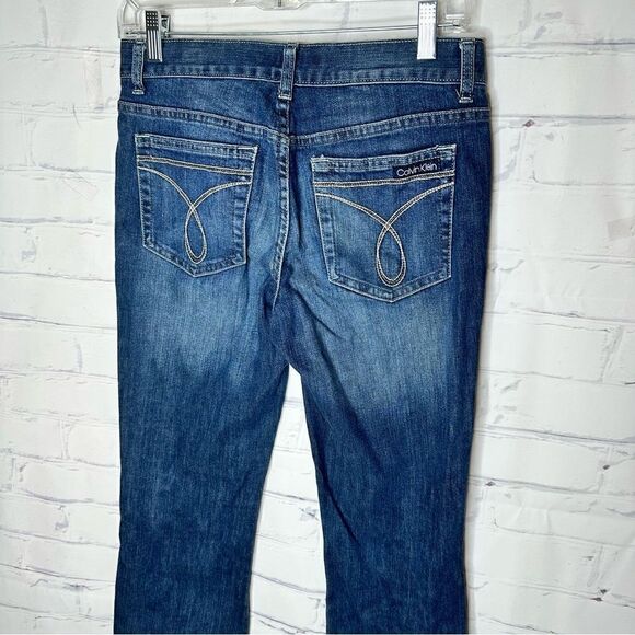Calvin Klein size 27/4 flare fit jeans - Picture 6 of 10